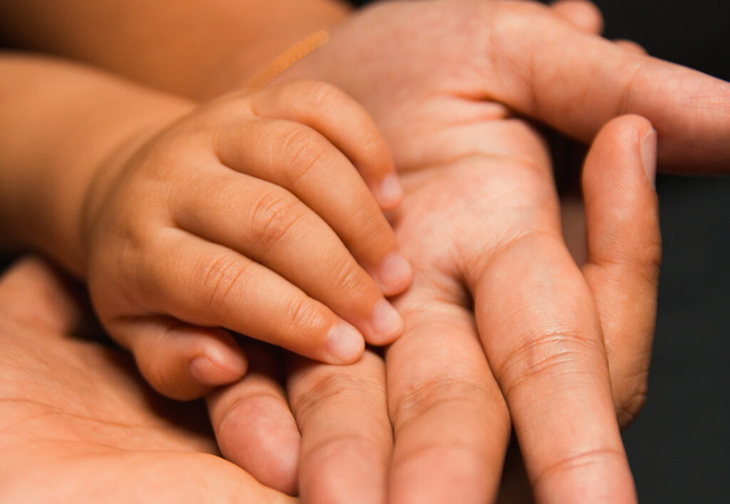 mãos família gerações